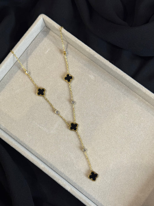 Golden elegance necklace with black clover and stones