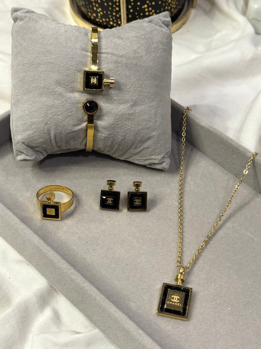 Stainless steel Chanel set in black and gold